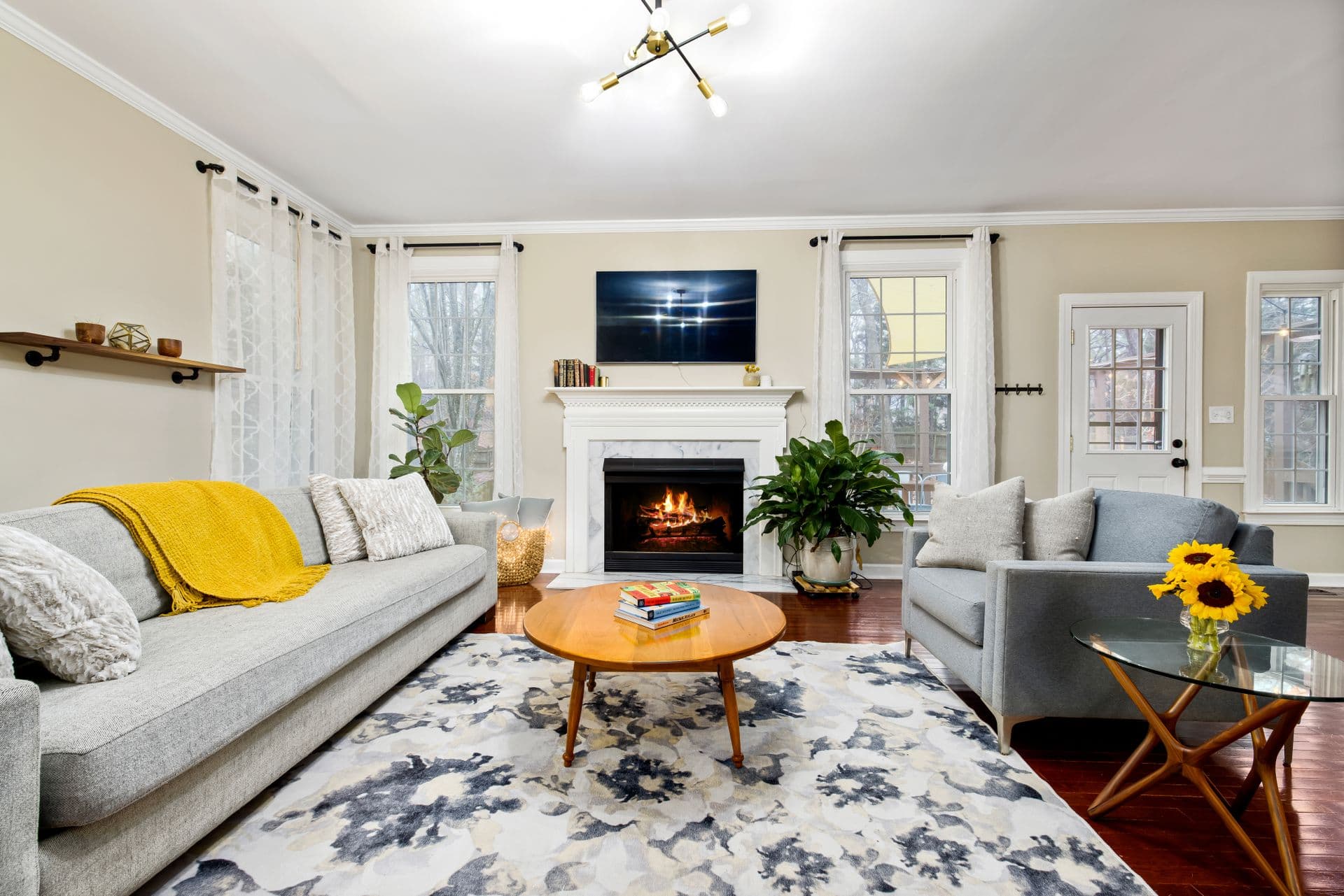 Freshly deep-cleaned living room carpet and area rug in a Boulder City home